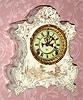 C.1901, Ansonia Clock Co., 8-day time and strike porcelain clock with open escapement, probably a promotional model for a wringer company. 