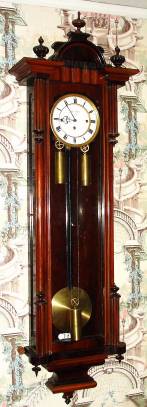 C.1850, Austrian, Anton Gostl, in Wien, 3-Wt, Grand Sonnerie wall clock, in a transitional case with key lock door, 72 beat case and mov't. — Antique Clocks Price Guide