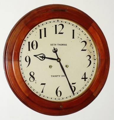 C.1913, (dated on rear), Seth Thomas Clock Co., "ARCADE", in fruitwood with cherry finish, 18" dial, 30-Day timepiece. — Antique Clocks Price Guide