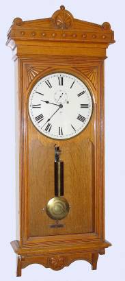 C.1909, Seth Thomas Clock Co., "Regulator No. 30", 8-day wall timepiece in golden oak. — Antique Clocks Price Guide