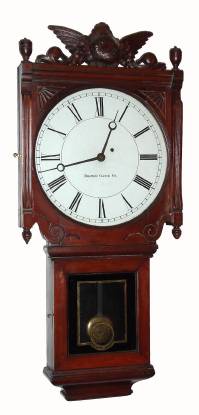 C.1890, Boston Clock Co., Boston, Mass, Office Regulator, in cherry, weight driven, 8- day timepiece, serial No. 163, and with original eagle crest. — Antique Clocks Price Guide