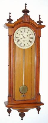 C.1880, E. Howard and Co., "Regulator No. 59-8", in oak, 8-day, weight driven timepiece, sometimes called the "Vienna" model. — Antique Clocks Price Guide