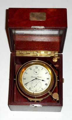 C.1940, English, Thos Mercer, Ltd, St. Albans,  56 hour chronometer No. 24189 in its original view top mahogany box (glass, no lid). — Antique Clocks Price Guide