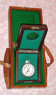 C.1943, Hamilton Watch Co., for U.S.Navy, Model 22, 21-jeweled 48-hour, up-down, pin set, deck watch in inner and outer Hamilton boxes. Engraved on the back of the case: "Chronometer Watch, Mfgr's Part No. 37615, Serial No. AF/45-D-922, P.O. No. (33-038)45-13085-AF, Hamilton Watch Company" — Antique Clocks Price Guide