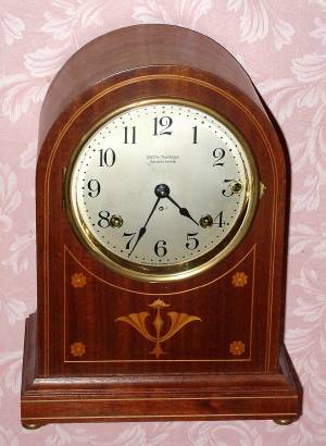 C.1913, Seth Thomas Clock Co., CHIME CLOCK No. 61, 5-Bell, Westminster, quarter hour chime clock, in a mahogany case with inlay. — Antique Clocks Price Guide