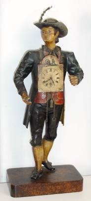 C.1880, German, Clock Peddler, and clock, made of painted tin on a rectangular wood base.. — Antique Clocks Price Guide