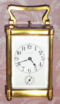C.1900, French, Brass Cased Carriage Clock, for Tiffany and Co, in a Doucine case with Nouveau influence, time, strike, repeat and alarm. — Antique Clocks Price Guide