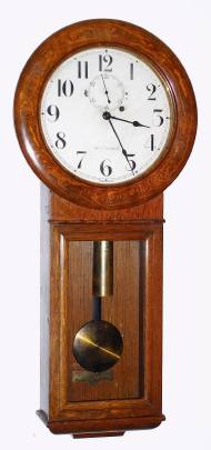 C.1920, Seth Thomas Clock Co., "Regulator No. 2"  in quartered oak and golden oak finish, 8-day, weight driven. — Antique Clocks Price Guide