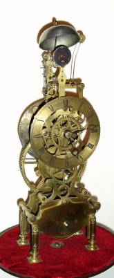C.1825, Scottish, R. [Robert] Wilkie, Cupar-Fife, WORLD TIME skeleton clock, with conventional 12 hour dial on one side and 24 dial opposite engraved with approx 52 major worldwide locations, single bell passing strike, fusee and large great wheel. — Antique Clocks Price Guide