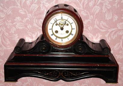 C.1900, French, 8-day time/strike black and red marble tambour clock retailed by Bigelow, Kennard and Co., Boston. — Antique Clocks Price Guide