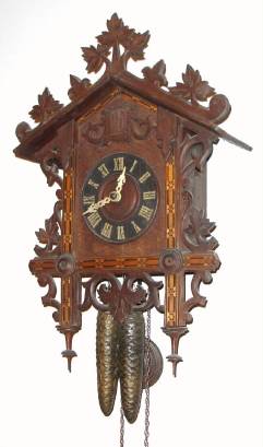 C.1890, German, 30-hour time/strike cuckoo wall clock. Movement is stamped: "Faller, Germany". — Antique Clocks Price Guide