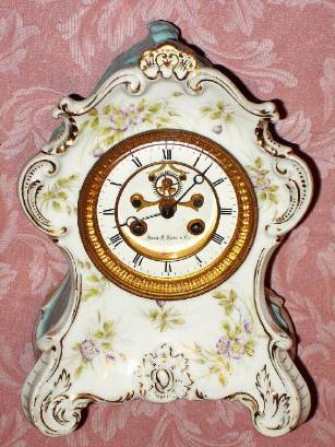 C.1900, French, Marti et Cie, 8-day time/strike porcelain mantel clock retailed by Alex M Hays and Co., New York, in a German case signed Silisien, Germany. — Antique Clocks Price Guide