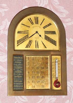 C.1900 French, 8-day brass cased perpetual calendar strut timepiece retailed by Marcus and Co., New York. — Antique Clocks Price Guide