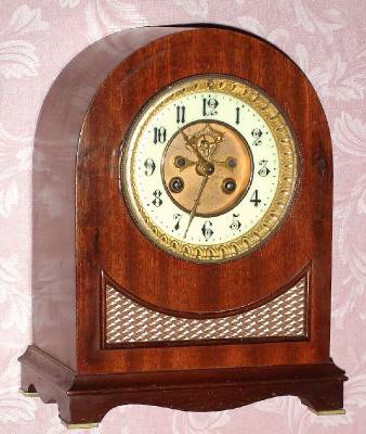 C.1900, Mixed lot consisting of a French movement with exposed escapement now fitted to a German mahogany veneered case. — Antique Clocks Price Guide