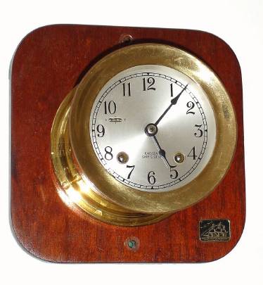 C.1979, Chelsea Clock Co., Boston, Mass, small screw bezel Ship's Bell, 3.75" dial. — Antique Clocks Price Guide