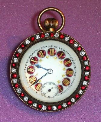 C.1900, Swiss, Glass Ball Paperweight clock, with a bezel of ruby and clear rhinestones, stem wind, pin set. — Antique Clocks Price Guide