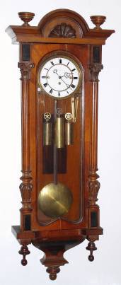 C.1875, Austrian, 3-Wt Grand Sonnerie wall clock in a walnut veneer case with carved Corinthian side columns, as-found. — Antique Clocks Price Guide