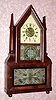 C.1845, Birge and Fuller, Bristol, Conn., 8-day "wagon spring" time and gong strike, twin candle stick sharp gothic-on-frame with J. Ives' Lever spring movement, shelf clock.