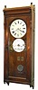 C.1888, E. Howard and Co., "Watch Clock for Two Watchmen", dial is 16", case 6 feet long and 26 inches wide, of solid walnut, with full length pendulum, seconds dial, dead beat escapement and maintaining power. 