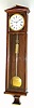 C.1830, Austrian, Dachluhr, Biedermeier era, 1-weight, 8-day in a slender mahogany veneer case with satinwood banding, mov't with one piece porcelain dial [5"], a smaller size clock. 