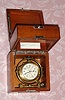 C.1942, Hamilton Watch Co., Model 22, 21-jeweled, 48-hour, up down, deck watch in a gimbaled mahogany Hamilton box. Adjusted to temperature and 6 positions. US Navy-Bu Ships 1942. The screw cap on the bottom of the case reads" MTD Watch, Bureau of Ships, U.S. Navy, 8885-1943". 