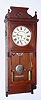 C.1883, Seth Thomas Clock Co., "FLORA" in mahogany, 8-day, 2-weight time and strike on cathedral gong, carved flowers on sides of the case. 