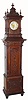 C.1898, German, Symphonion Hall Clock, No. 30St, in oak with Lenzkirch time and strike clock on top (two piece case), plus 35 original discs. 