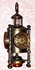 C.1890, French, "Davy Lamp",, from the industrial series, clock case in the form of a lantern, with 3 sides, with a barometer in one, thermometer in the second and timepiece in the third, compass at top. 