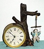 C.1895, Ansonia Clock Co., SWING No. 2, with old but not original doll. 