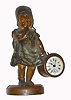 C.1885, Ansonia Clock Co "Good Night" novelty clock, patinated spelter statue of a young girl in her nighty, carrying a drum in her left hand, that contains the clock, the base with plaque that reads "Good Night". 