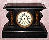 C.1900, E. N. Welch Mfg. Co., "Metropolis",  8-day time and strike wood black mantel clock. 