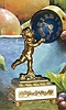C.1890, French, Ormolu and Marble MINI figural timepiece, a cherub holding a globe aloft containing a very small cylinder movement. See clock next to life sized fruit bowl for comparison. 