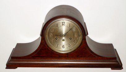 C.1920, Herschede Hall Clock Co., Cincinnati, OH: Model 10 chime clock in mahogany with time, strike and choice Westminster or Canterbury quarter-hour chime on six rods, raised numerals on dial. — Antique Clocks Price Guide