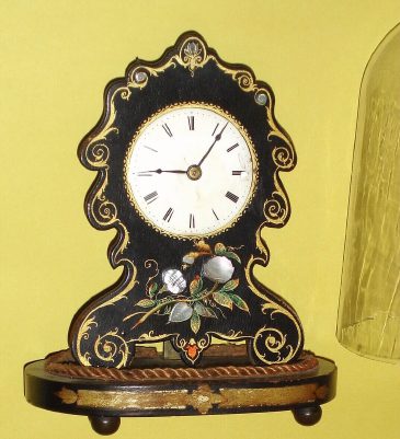 C.1853, Chauncey Jerome, New Haven, shelf timepiece, with patent S.N. Botsford movement, in a Litchfield Mfg. paper mache case. — Antique Clocks Price Guide