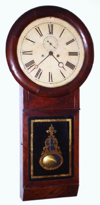 C.1855, Henry Terry, Plymouth, Conn, Office Regulator, Striking, 2-weight, 8-day in a rosewood and grained case. Both the case and movement were designed by Henry's brother Silas. Henry funded S.B. Terry's business in 1949, and a few styles of clocks appear with only the label of Henry Terry, such as this one. The movement is virtually identical to that used by Seth Thomas in their striking "No.1-Extra", since they purchased the right to manufacture the several regulator designs of S. B. Terry in 1859 for $750. Movement has maintaining power and dead-beat escapement. — Antique Clocks Price Guide