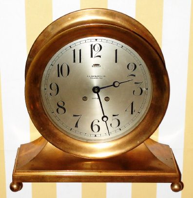 C.1912, Chelsea Clock Co., COMMODORE, or Base and Ball, 8.5"dial, eight-day Ship's Bell retailed by S.A. MacQueen and Co., Philadelphia (on dial). — Antique Clocks Price Guide