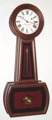 C.1977 [dated movement], E. Howard and Co., No. 5 Banjo timepiece, 8-day weight driven in a solid mahogany case with walnut finish, serial No. 11. — Antique Clocks Price Guide