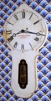 C.1875, E. Howard and Co., Model 28 Marble Front, as-found with epoxy filled-in chunk near 9 o'clock. — Antique Clocks Price Guide
