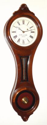 C.1976 (mov't dated 3-19-76) E. Howard and Co., Boston, Regulator No. 10, figure eight wall clock in a walnut case, 8-day weight driven, time only, serial No. 60. This clock was among the first shipped when this re-issue model was introduced in 1976, and was sold by advance subscription to NAWCC members. — Antique Clocks Price Guide