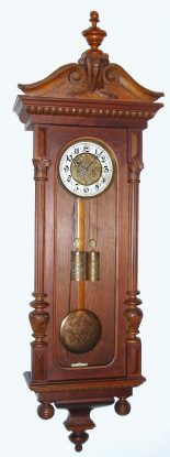 C.1890, Austrian, 2-Wt "Vienna Regulator", in a nice walnut case with Corinthian columns and ringed finials, and an old top from another clock, matching brass pattern. — Antique Clocks Price Guide