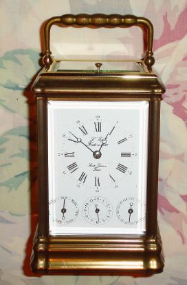 C.1980, /modern/ French, L'Epee, Gorge Cased  calendar carriage clock with time, strike and repeat, subsidiary dials at the bottom of the main dial for day and date. — Antique Clocks Price Guide