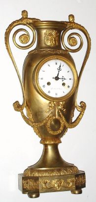 C.1870, French, Urn-motif  mantel clock, in the style of a century earlier. Large ormolu case with very well chased figures and 8-day time and strike movement. — Antique Clocks Price Guide