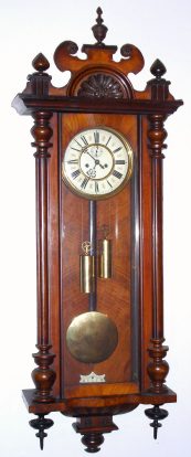 C.1895, German, Gustav Becker, 2-Wt, Vienna Regulator,  8-day, in a walnut case with removable top and finials. — Antique Clocks Price Guide