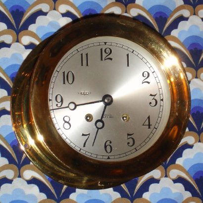 C.1983, Chelsea Clock Co., "The Chelsea", 6" dial, 8-day Ship's Bell, cast yellow brass case.. — Antique Clocks Price Guide