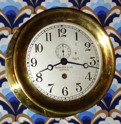 C.1919, Chelsea Clock Co., 6" dial, cast yellow brass case with screw bezel, for Harrison and Co, Montreal 8-day timepiece. — Antique Clocks Price Guide