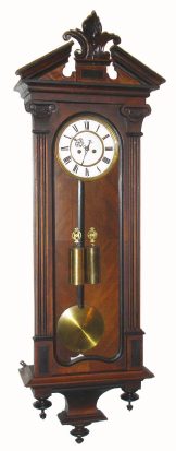 C.1875, Austrian, "Remember" 2-Wt "Vienna Regulator", in an Alt Deutsch case with pilaster trim on the door, having carved capitals, and with old top. — Antique Clocks Price Guide