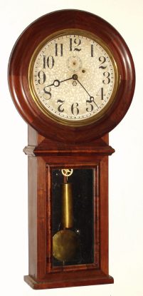 C.1880, New Haven Clock Co, Office No. 1, round drop wall regulator, 1-weight, 8-day, figured walnut. — Antique Clocks Price Guide