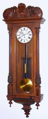 C.1890, Austrian, 1-Wt "Vienna Regulator", timepiece in a walnut wall case of the Alt Deutsch style, with a top from another piece of furniture. — Antique Clocks Price Guide