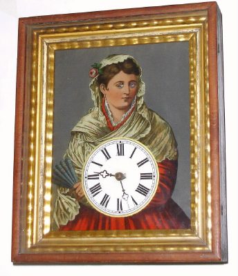 C.1890, German, Picture Frame Novelty, with roving eyes moving side to side, a gypsy reverse painted on glass and eyes showing two holes in the glass. Wooden plated movement. No weights. No Pendulum. — Antique Clocks Price Guide