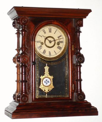 C.1880, E. N. Welch, CARY model rosewood shelf clock 8- day, less top and one trim button. — Antique Clocks Price Guide
